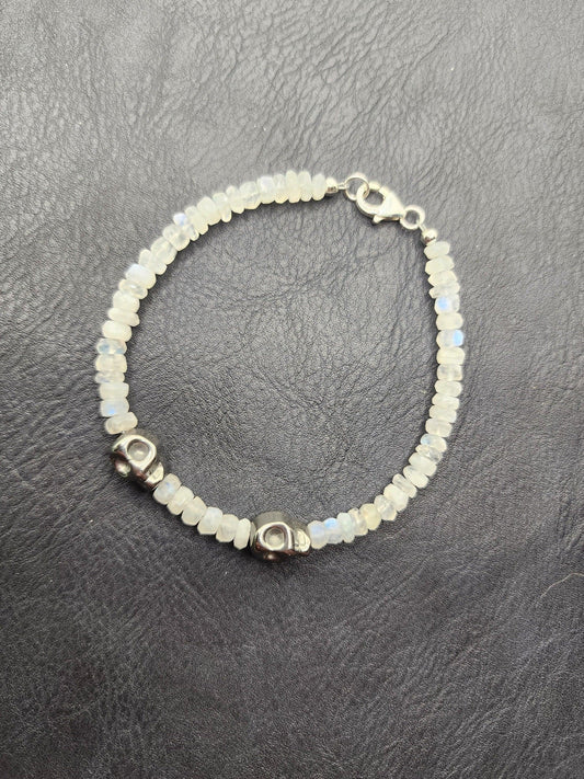 Moonstone bracelet with hematite skulls. Sterling silver clasp and accessories. - Beaunique Boutique